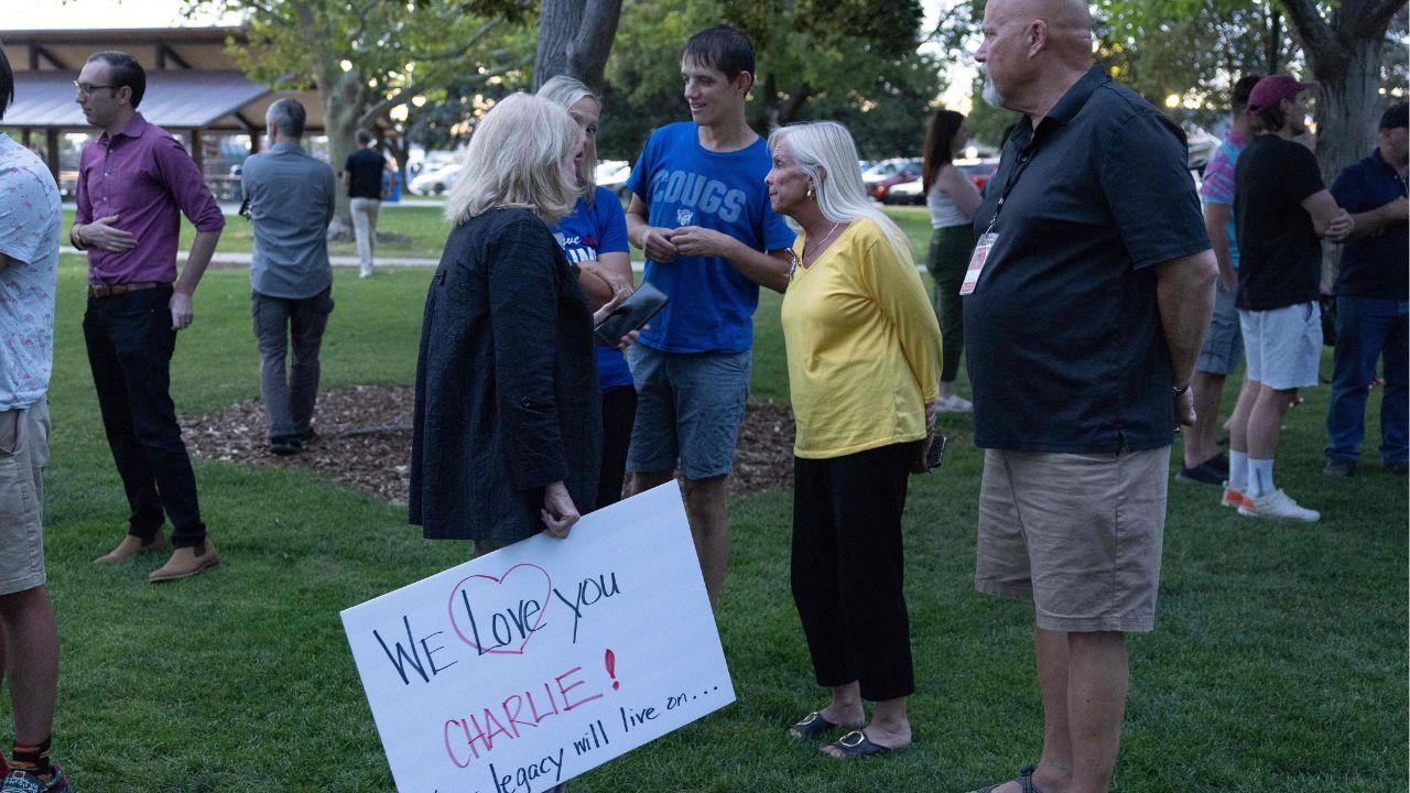 People attend a vigil for youth activist and influencer Charlie Kirk, who was shot at a public event at Utah Valley University